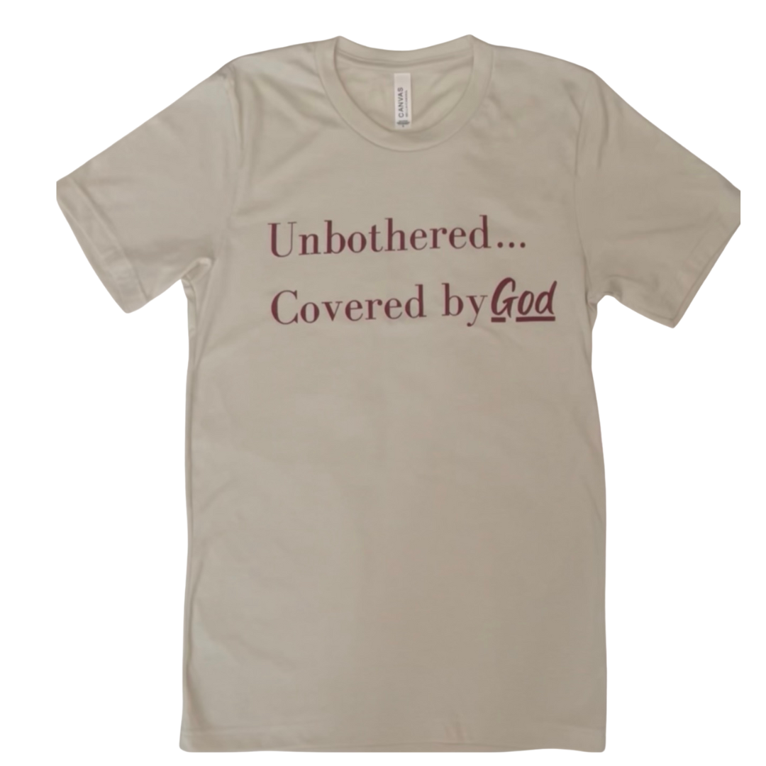 Our Unbothered...Covered by God tee is a reminder to continue making moves even when fear is present and knowing God is leading and covering us through it all. We are One LOVE through Christ!